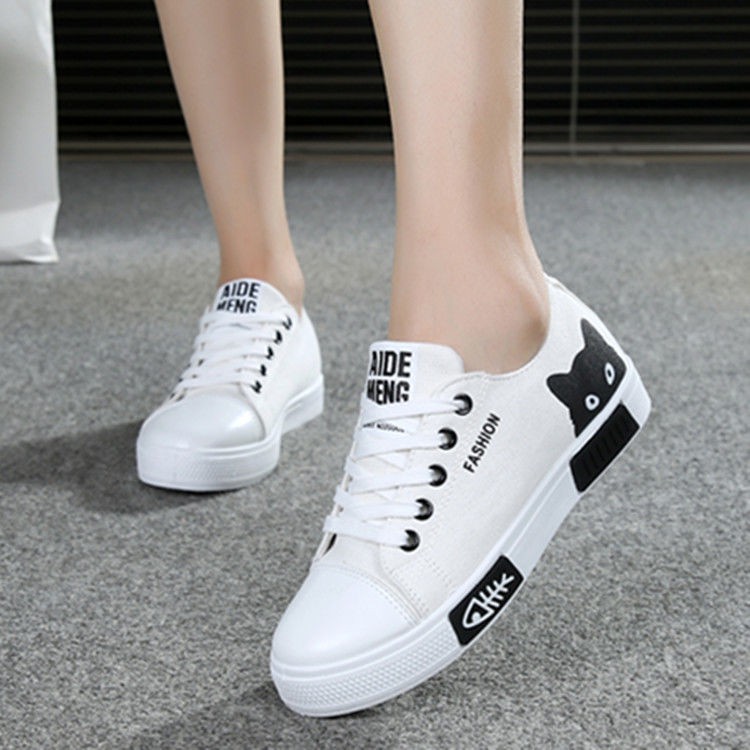 girl white canvas shoes