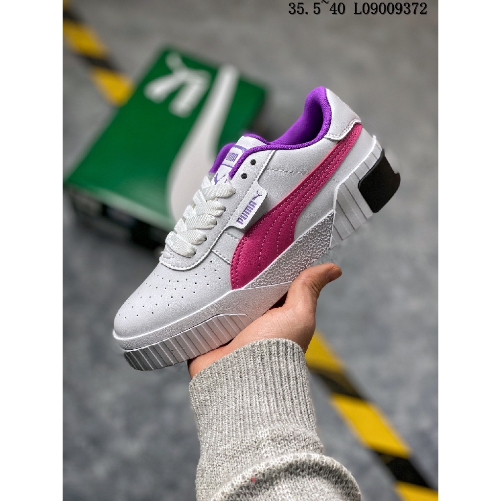 purple and gold puma shoes