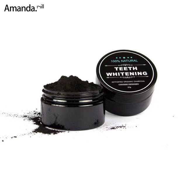 Teeth whitening with charcoal capsules