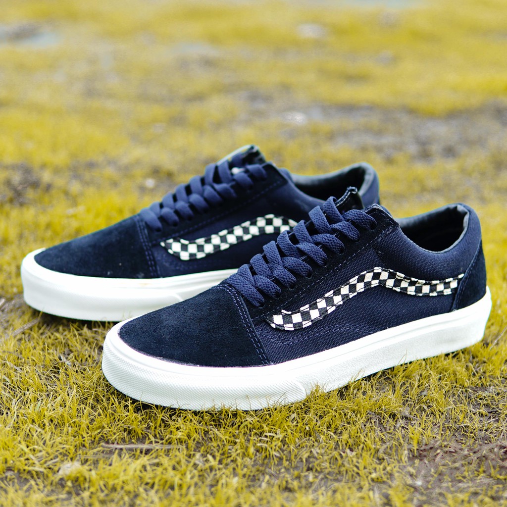 blue vans with yellow stripe