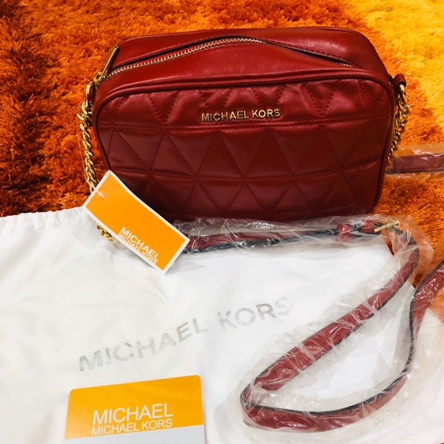 mk red sling bag