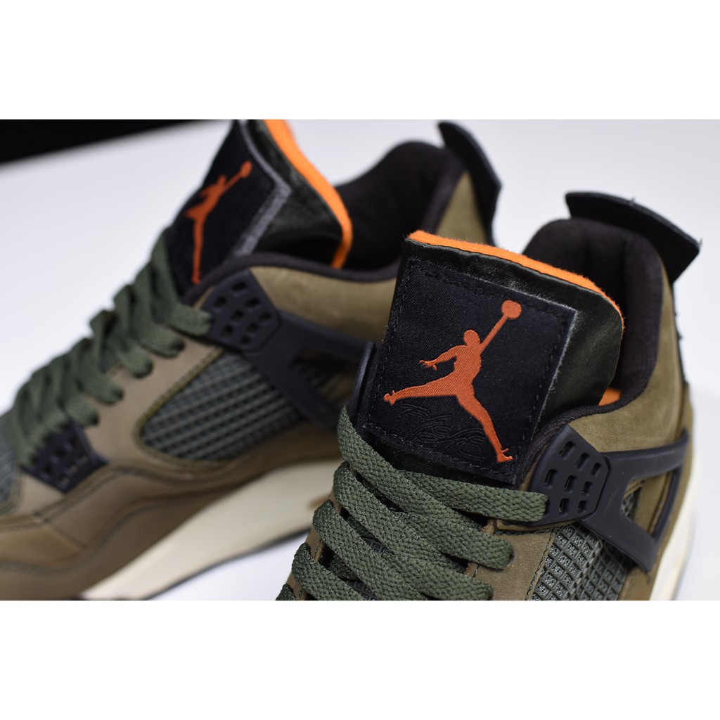 green and orange jordan 4s