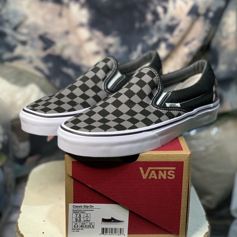 gray slip on checkered vans