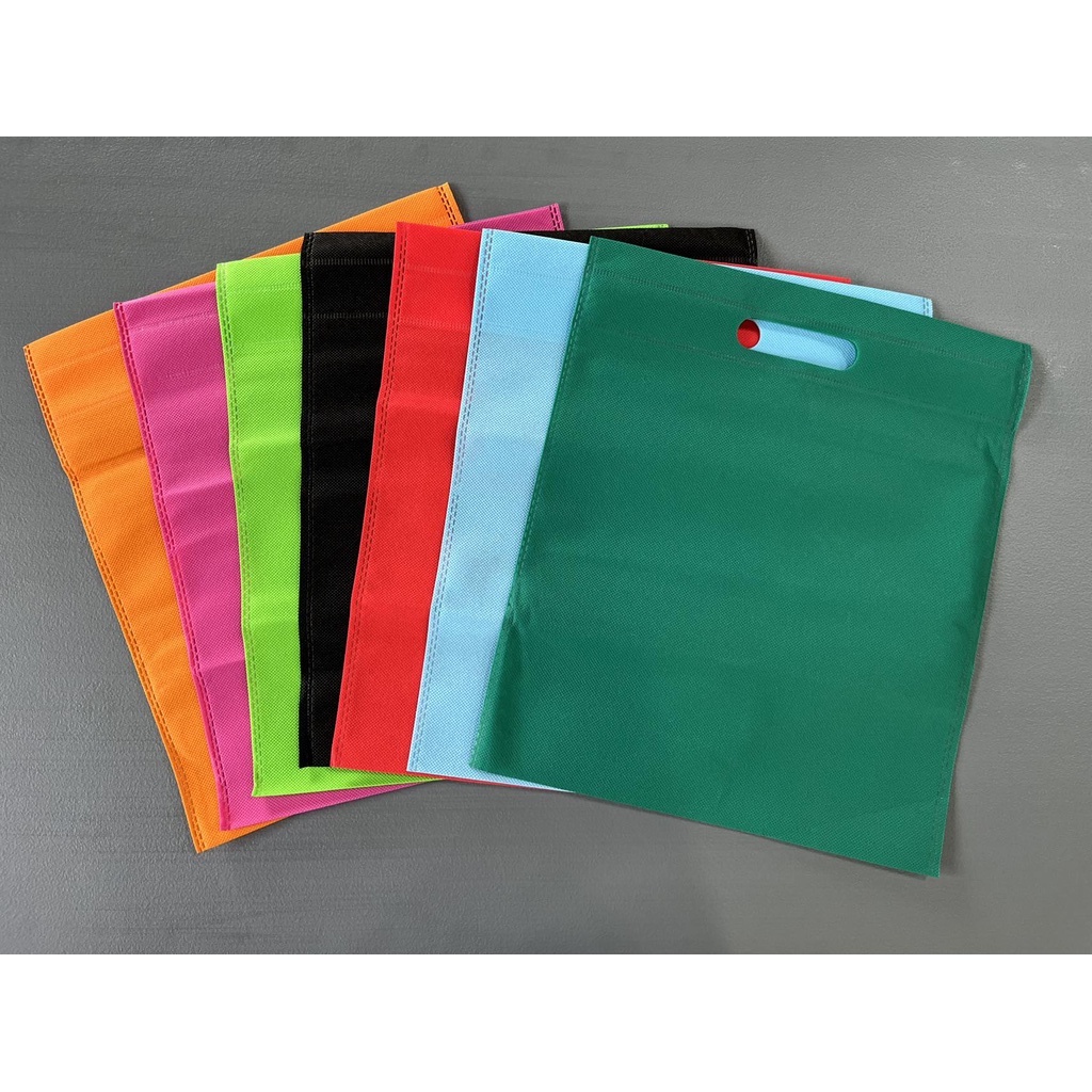 25 Pcs Flat Eco Bag 4 Sizes 9 Colors D Cut Pouch Plain Non-woven ...