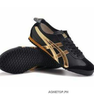 black and gold asics tigers