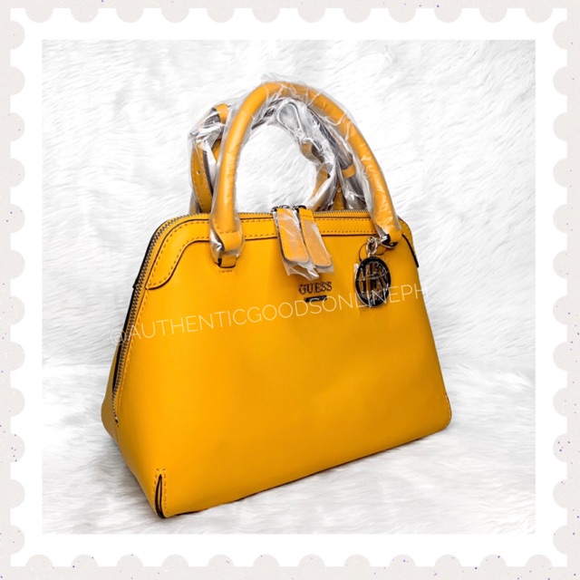 mustard guess handbag