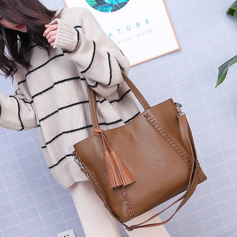 shoulder bag with tassels