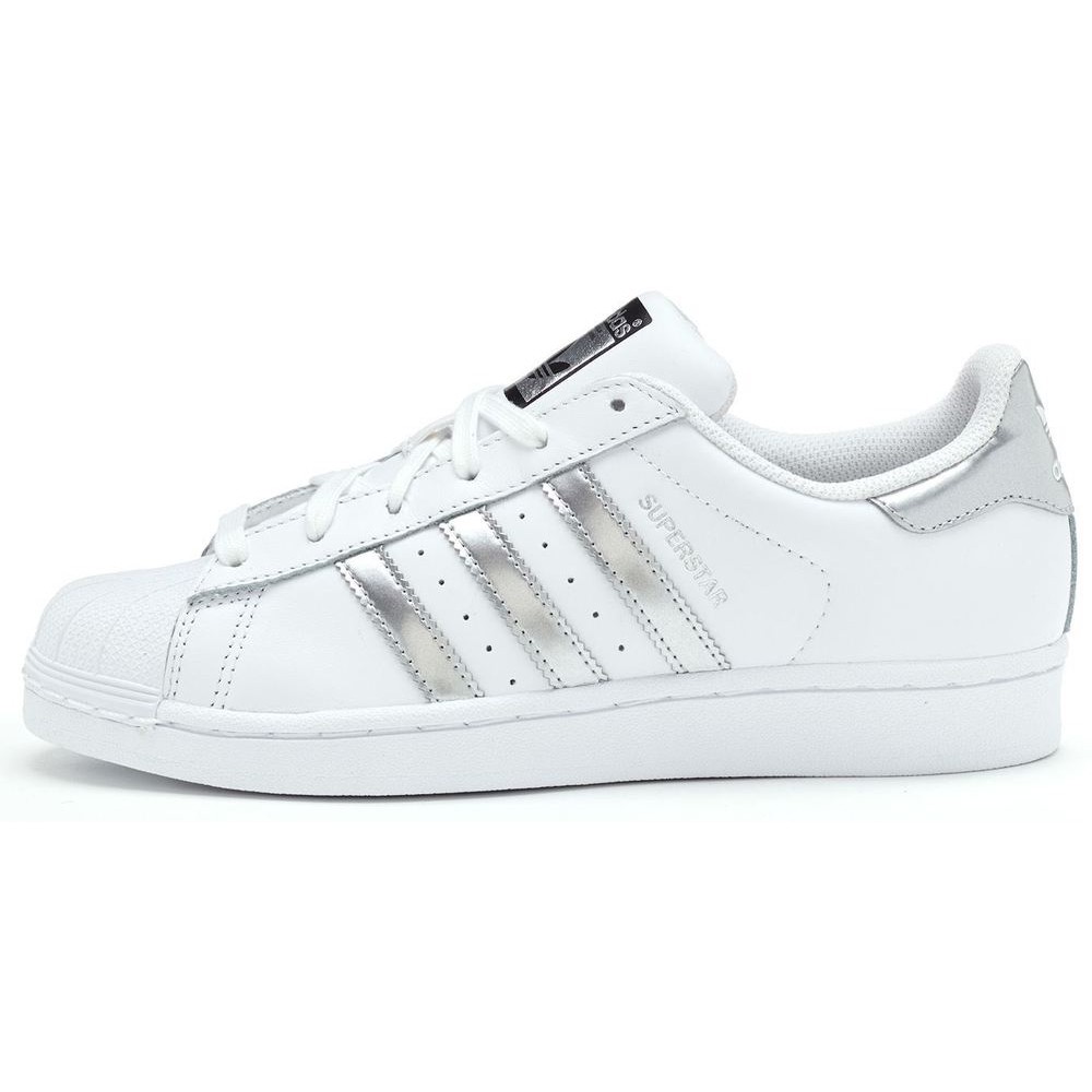 white adidas with silver stripes