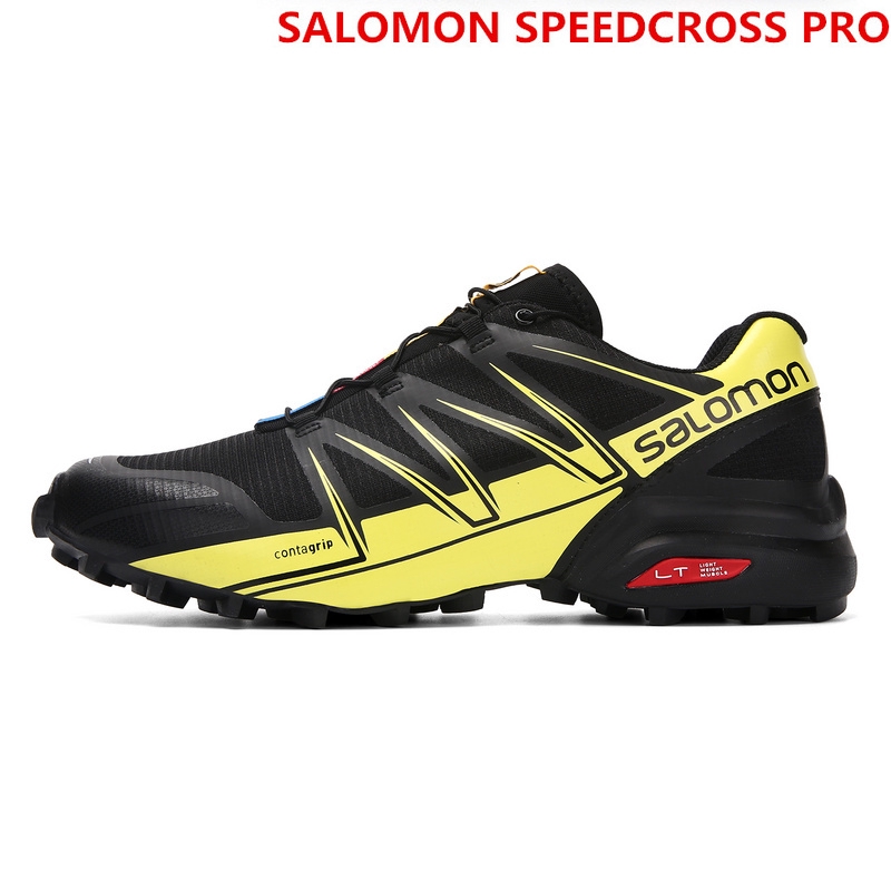 yellow salomon shoes