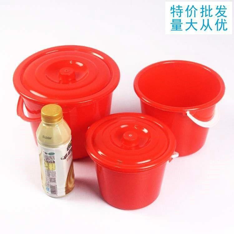 small red plastic buckets