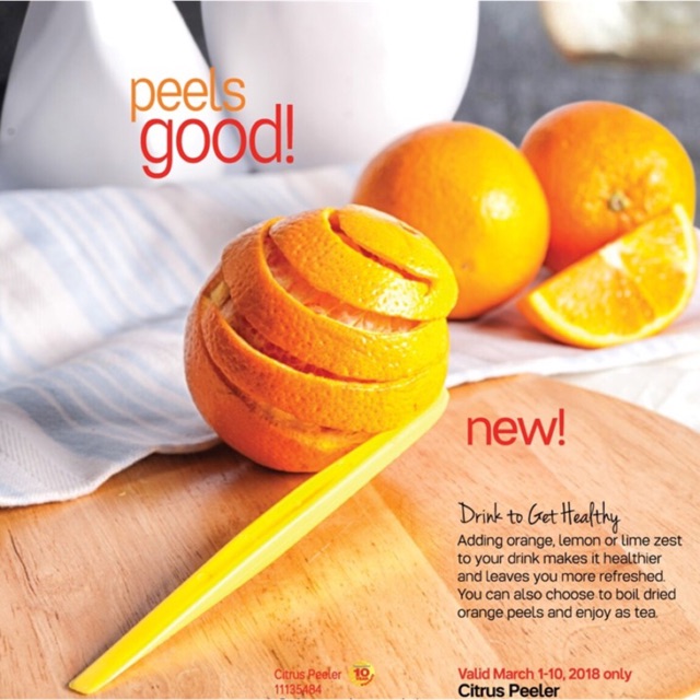 Orange Tupperware Citrus Peeler by Tupperware