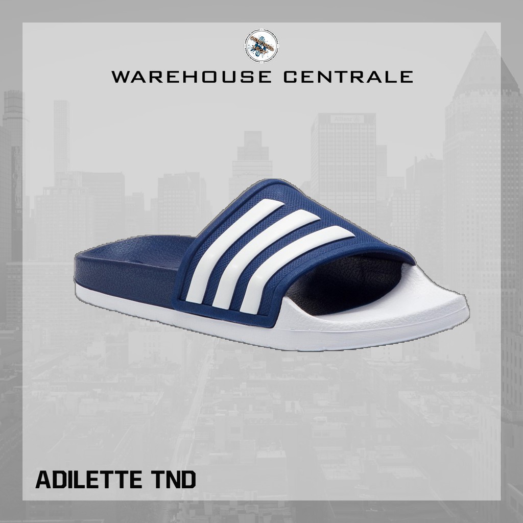 navy blue adidas slides