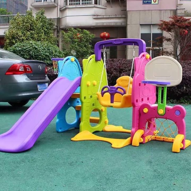 outdoor playhouse with slide and swing