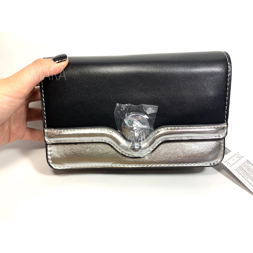 black and silver clutch