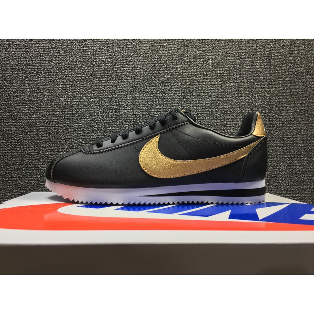 nike cortez black gold suede