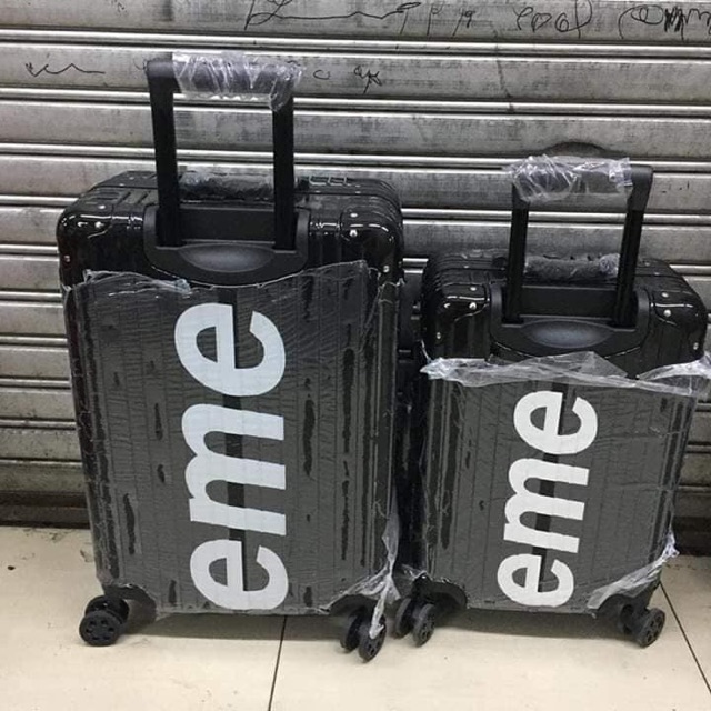 silver supreme trolley bag