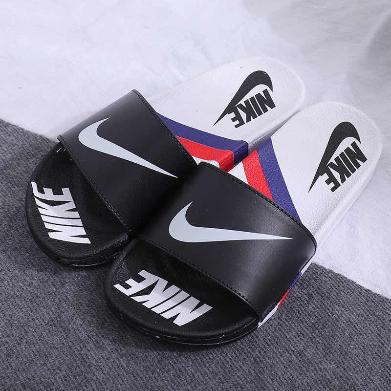 red and black nike slippers