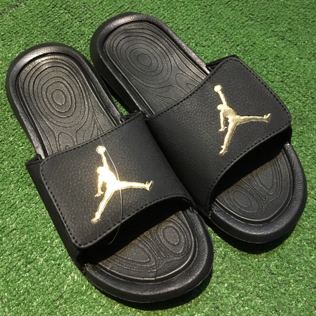 black and gold jordan slides