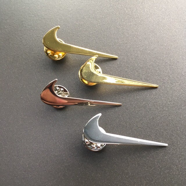 silver nike swoosh pin