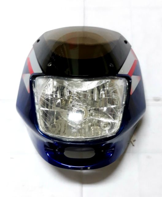 ct 100 headlight cover