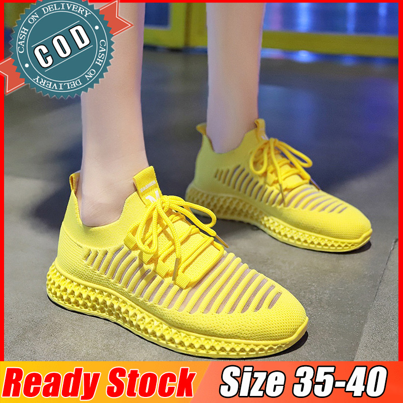 yellow and pink sneakers