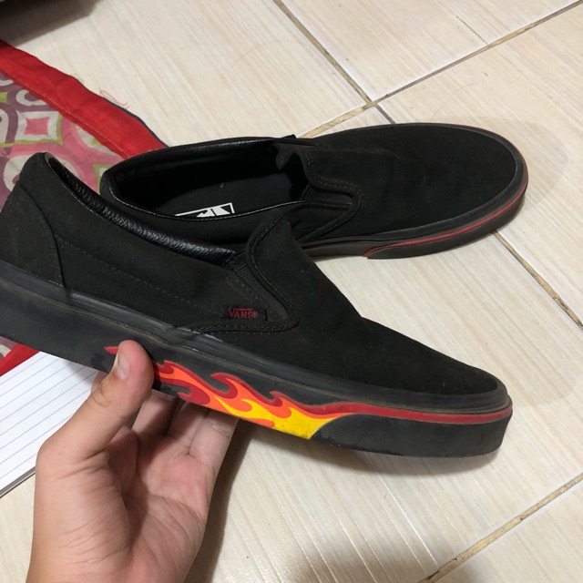 vans black flame slip on