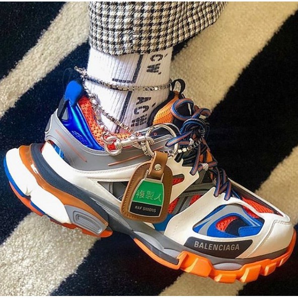 balenciaga track white orange on feet