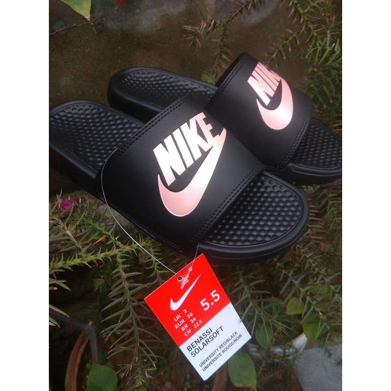 nike slippers black and gold