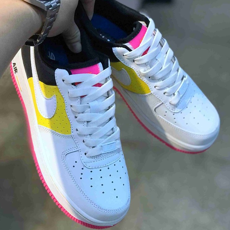 tan black and white nike