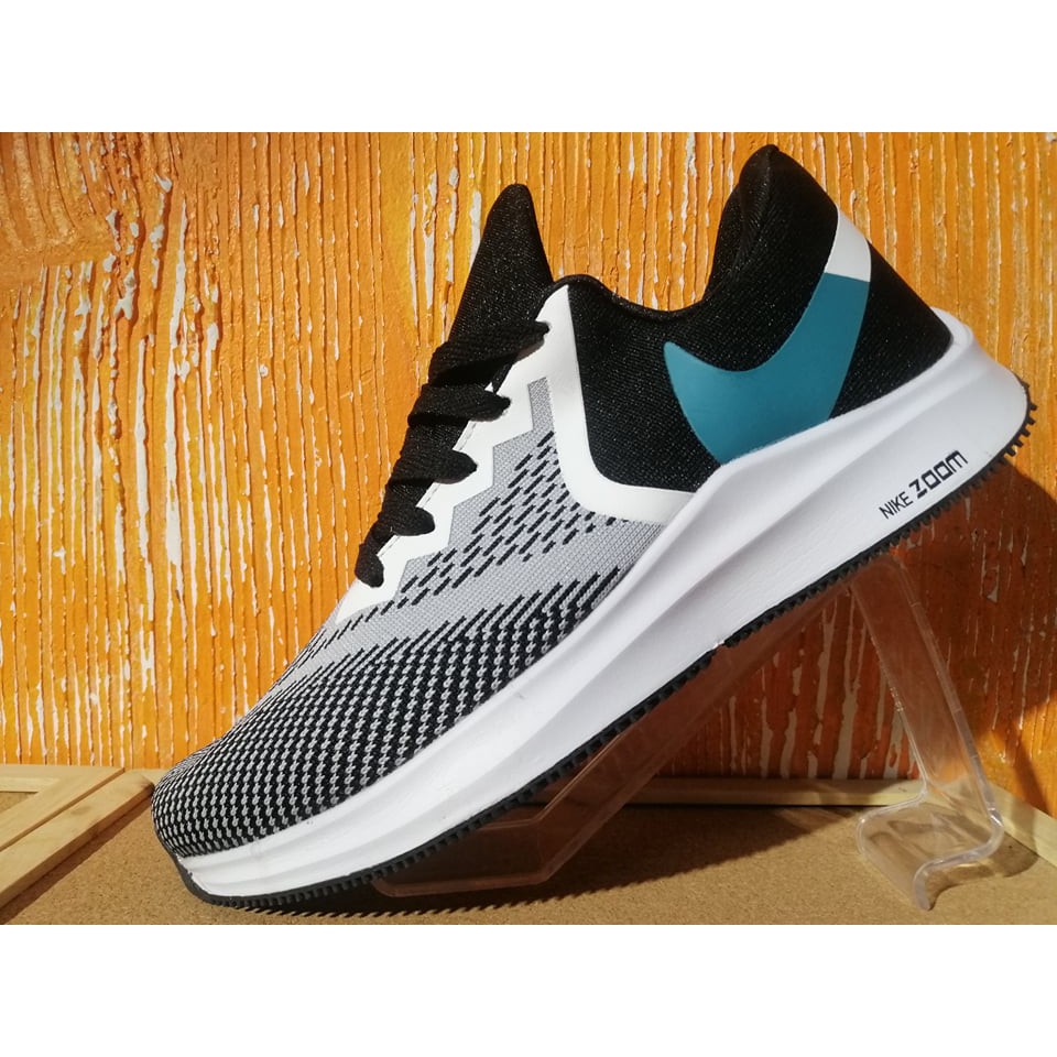 black and green nike zoom