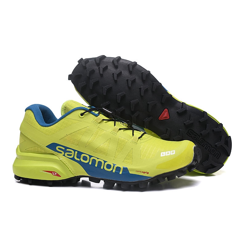 yellow salomon shoes