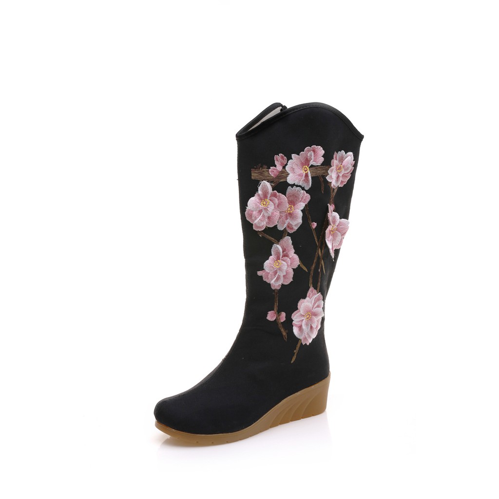 rider boots with belt attached