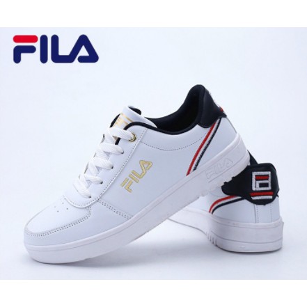 fila all white sneakers