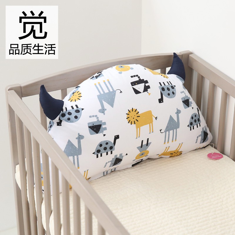 pillow in crib