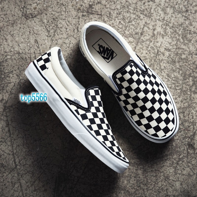 white and silver checkered vans