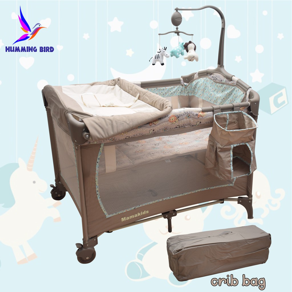 baby cot with nappy changer