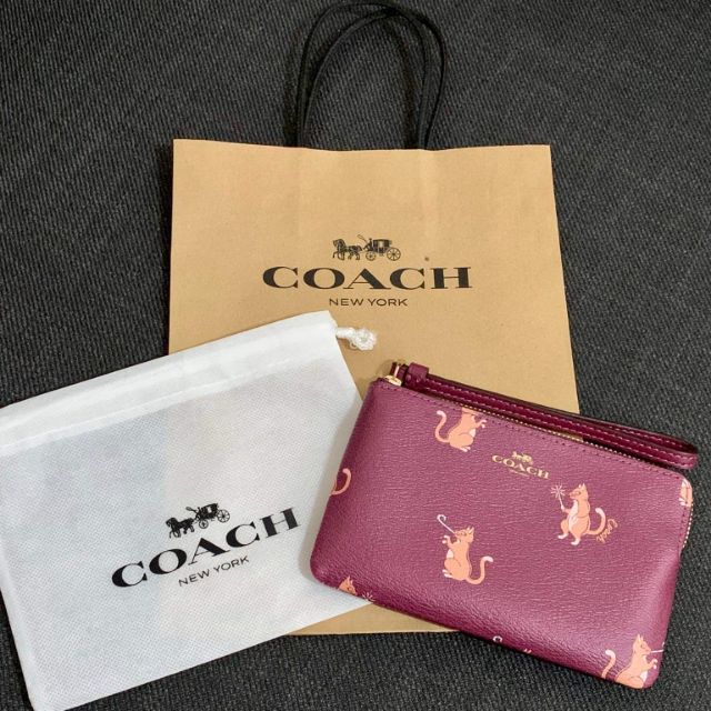 coach cat purse