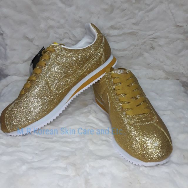 gold cortez shoes