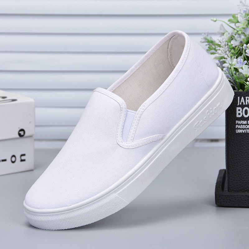 white flat slip on shoes