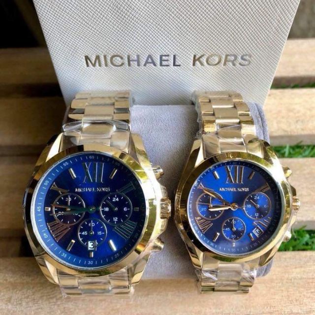 mk gold watch with blue face
