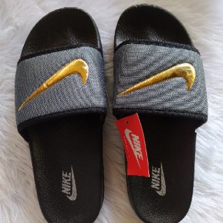 gold check nike slides