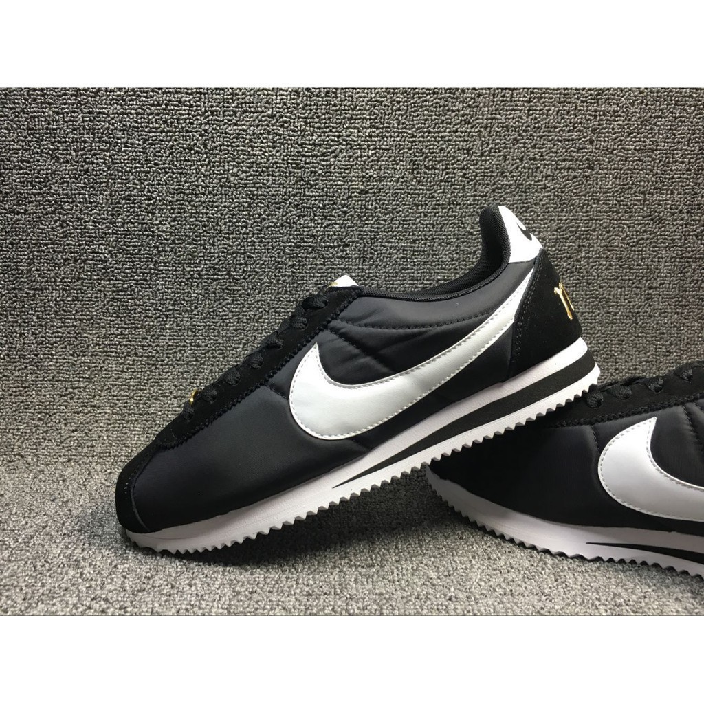 nike classic cortez womens black and gold