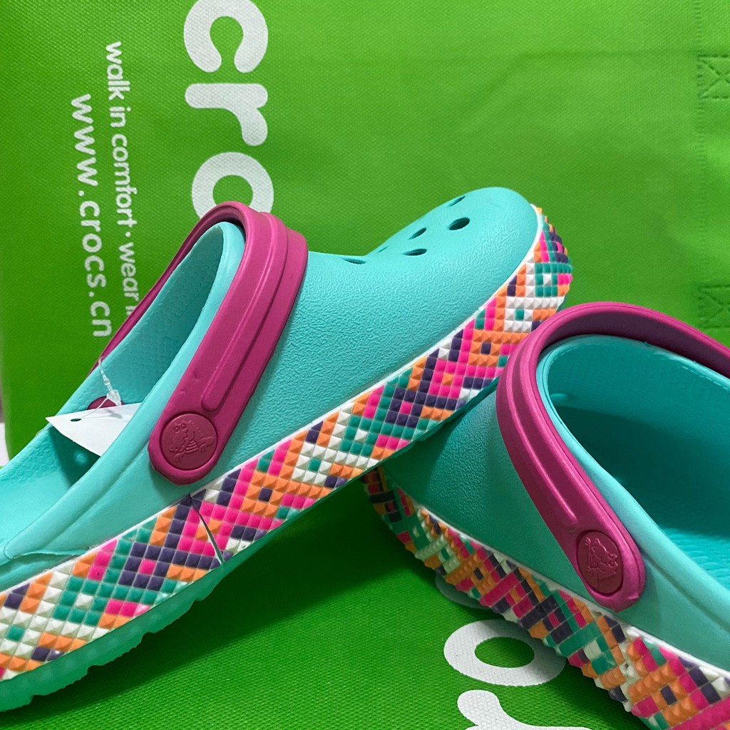 black and rainbow crocs