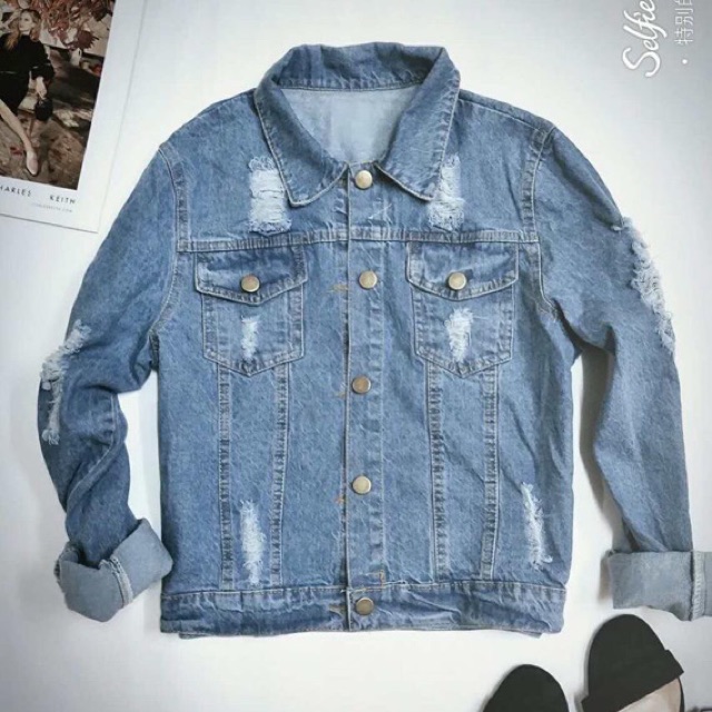 tattered jean jacket