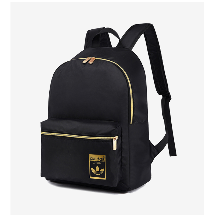 gold and black adidas backpack