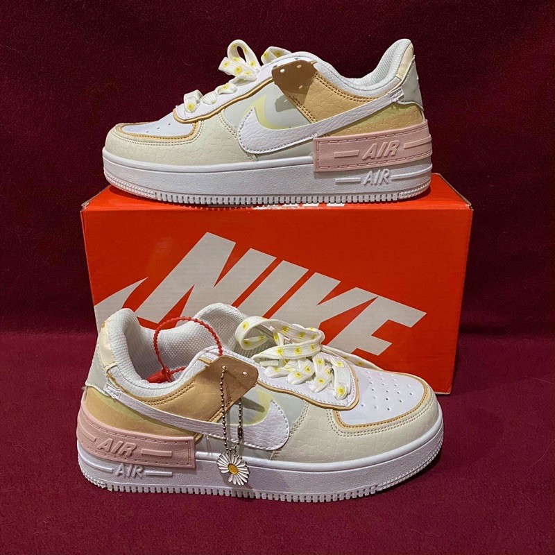 nike daisy shoes