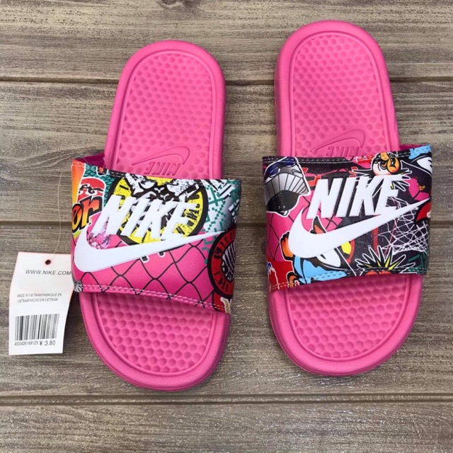 buy nike slippers at 50 off