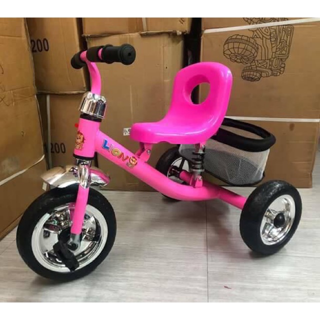 pink toddler bike with basket