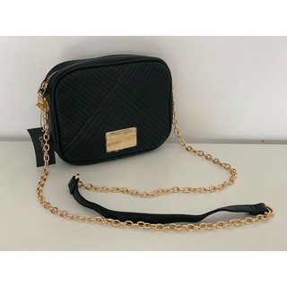 black sling bag with gold chain