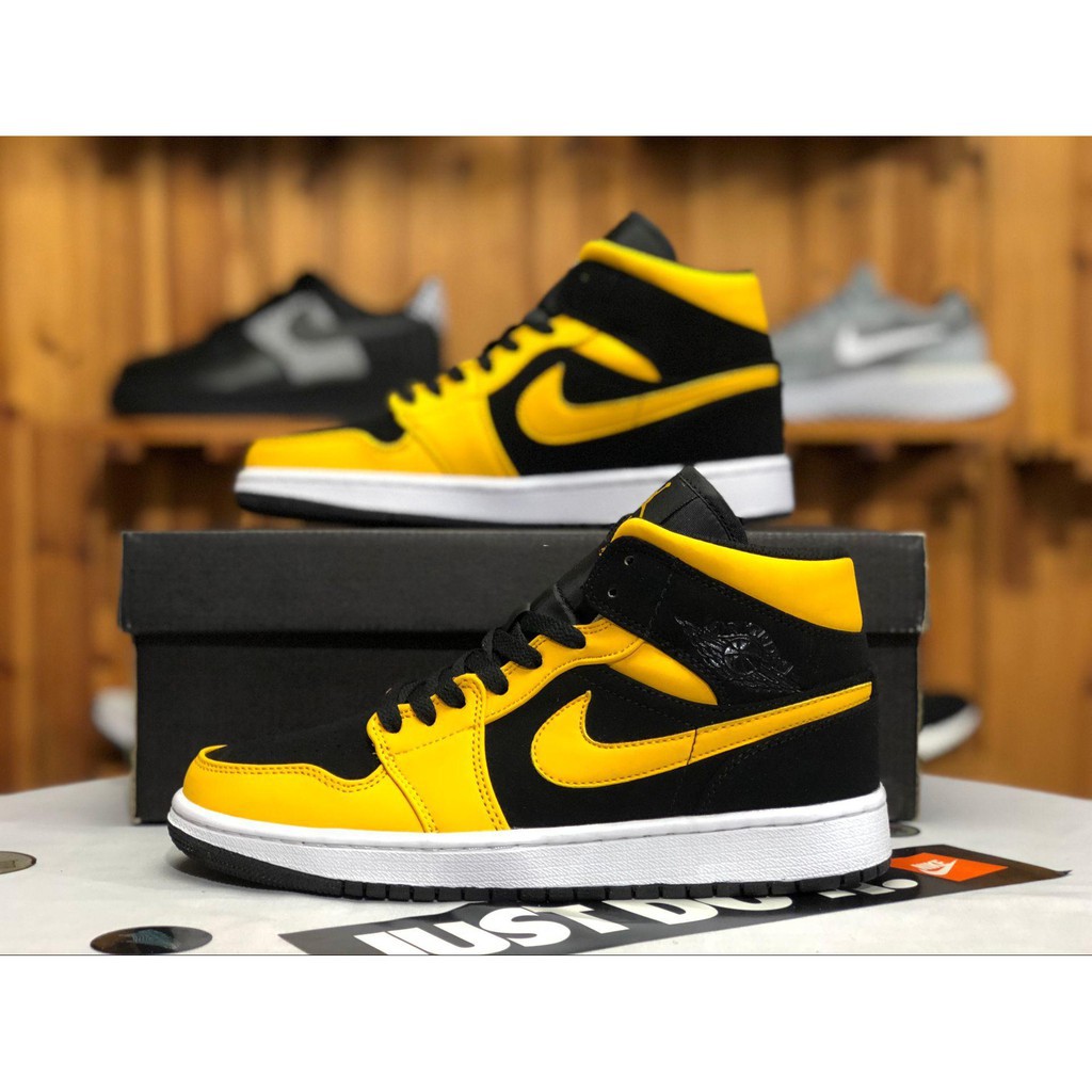 nike black and yellow high tops
